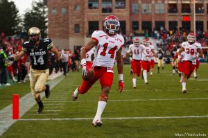 Trent Nelson  |  The Salt Lake Tribune
Utah Utes wide receiver Reggie Dunn (14) returns a kick for a touchdown in the fourth quarter as the Colorado Buffaloes host the University of Utah Utes, college football Friday November 23, 2012 in Boulder.