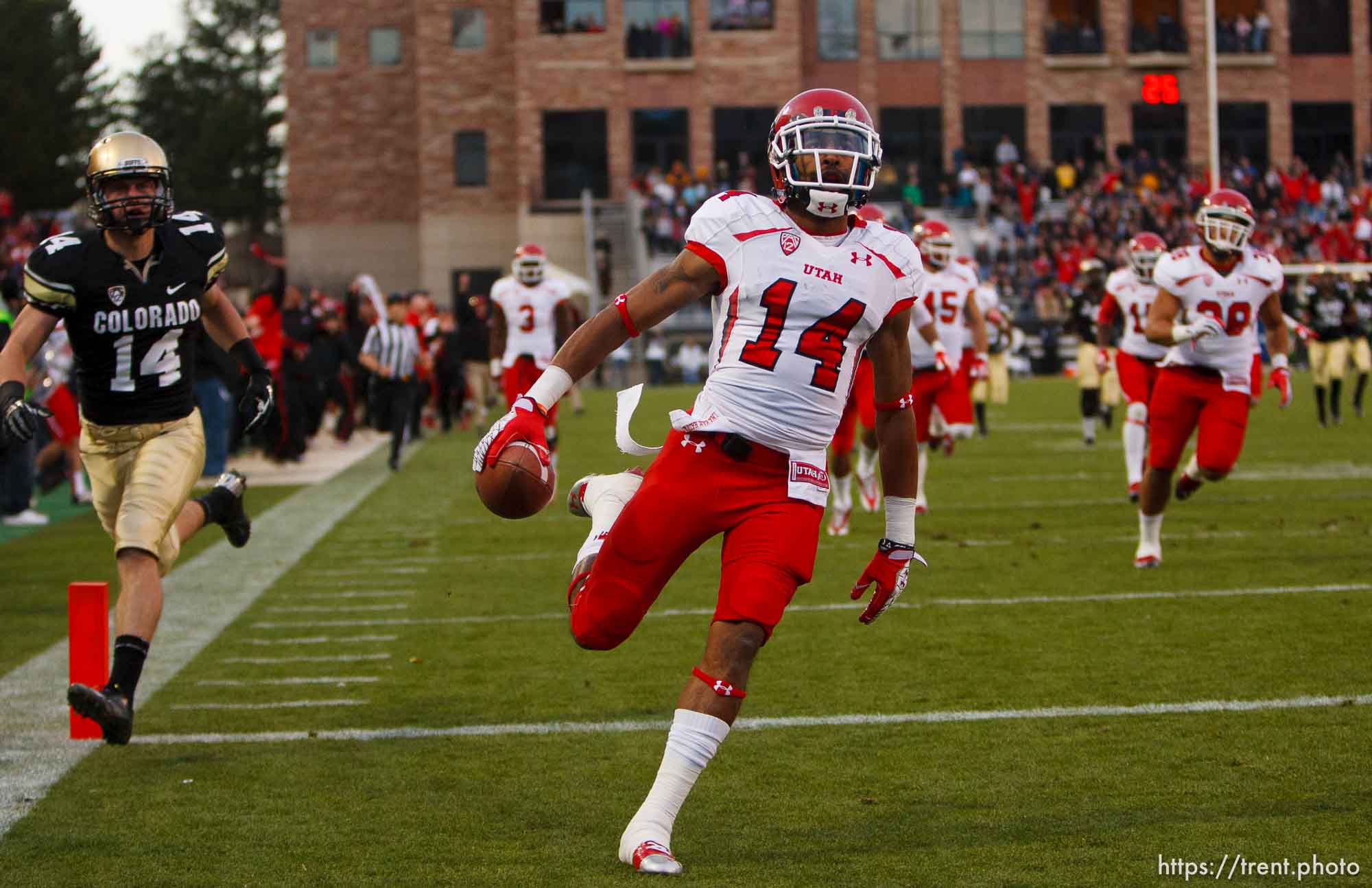 Trent Nelson  |  The Salt Lake Tribune
Utah Utes wide receiver Reggie Dunn (14) returns a kick for a touchdown in the fourth quarter as the Colorado Buffaloes host the University of Utah Utes, college football Friday November 23, 2012 in Boulder.