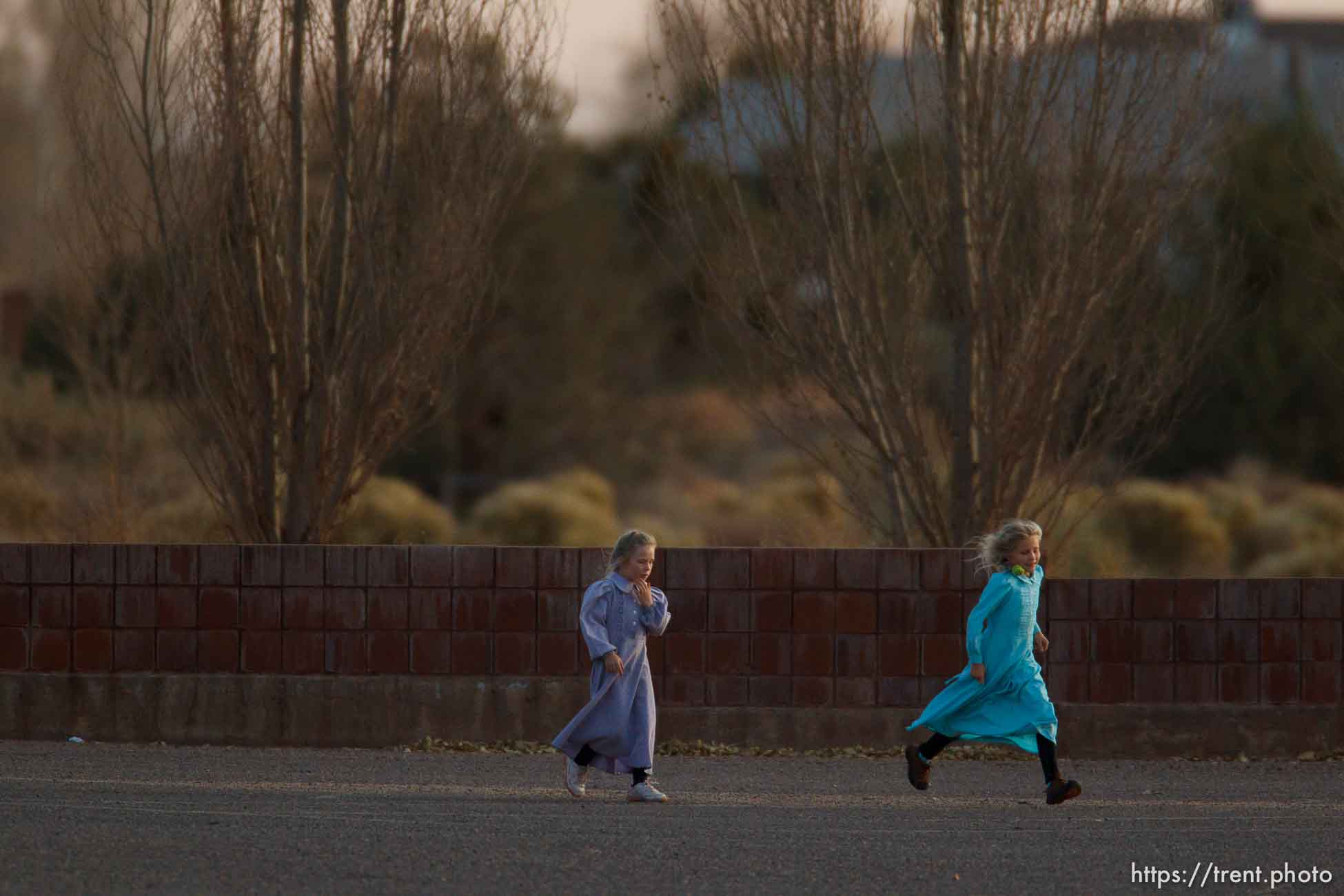 girls running in LSJ parking lot, Thursday November 29, 2012.