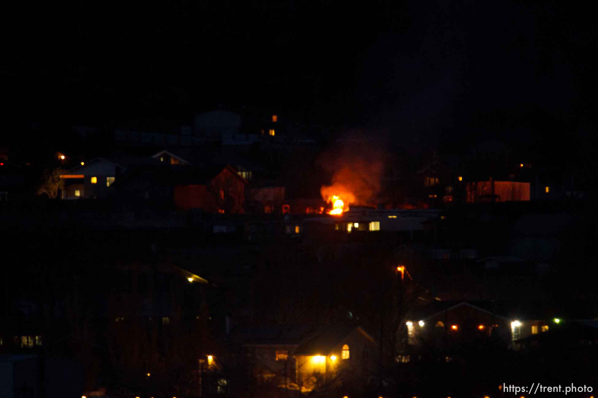 fires burning in town at night, Thursday November 29, 2012.