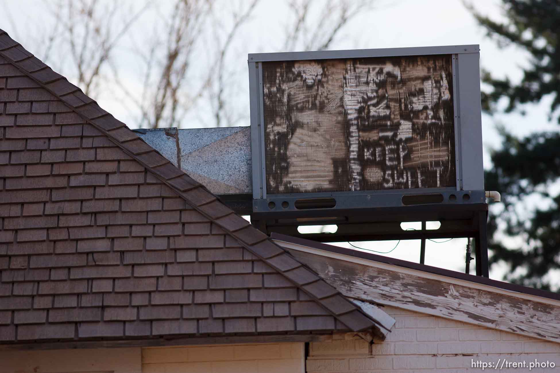 Trent Nelson  |  The Salt Lake Tribune
The FLDS phrase Keep Sweet appears on a cooling unit above a home Thursday November 29, 2012 in Colorado City.