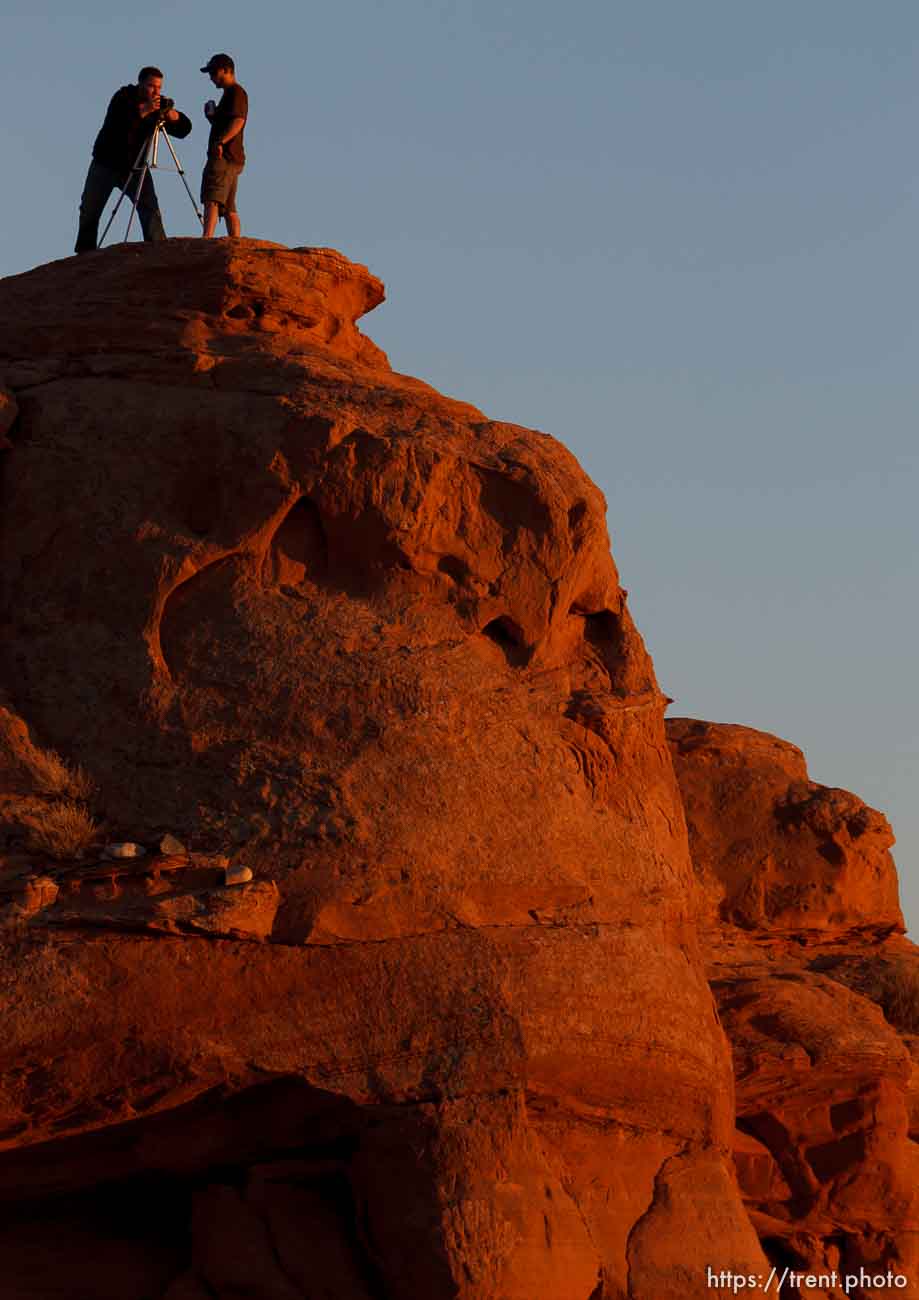 photographer at sunset above Moab, Wednesday April 3, 2013.