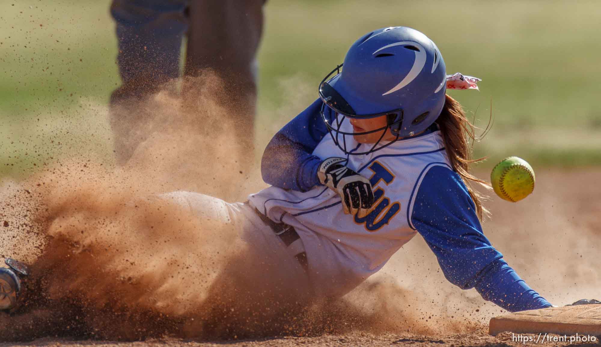 Trent Nelson  |  The Salt Lake Tribune
Taylorsville's Korlee Jensen slides into second as Taylorsville defeats West High School softball, Thursday April 18, 2013 in Taylorsville.