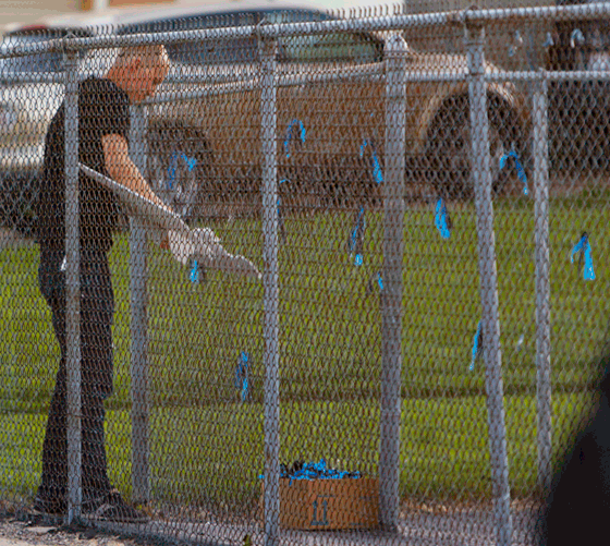 Trent Nelson  |  The Salt Lake Tribune
A man rips up a sign showing support for the Ogden Police Department and Dee Smith, which was hanging on a fence near the meeting point for marchers walking in memory of Matthew Stewart, Wednesday June 5, 2013 in Ogden.