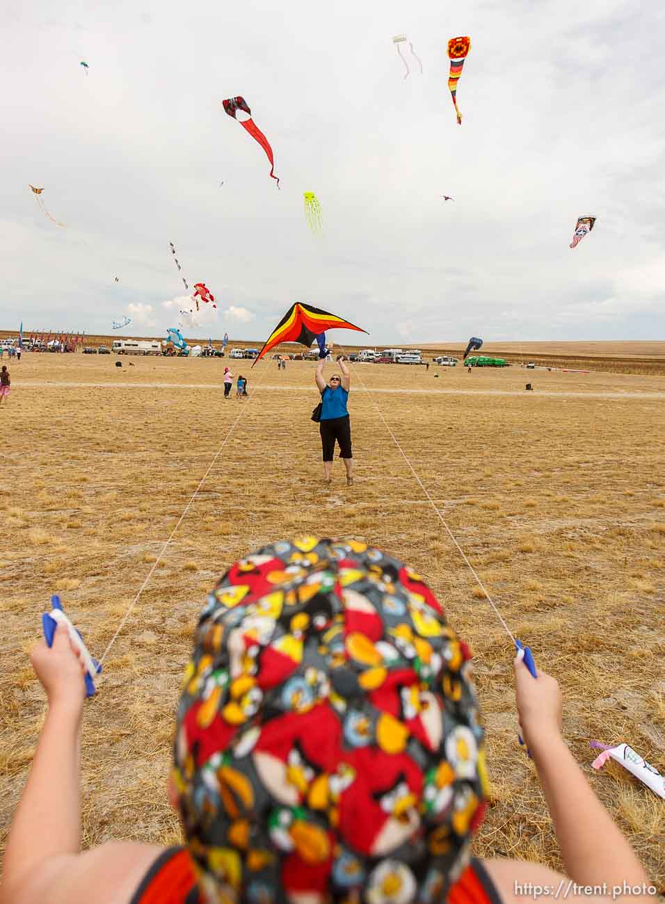 Trent Nelson  |  The Salt Lake Tribune
Connor Vincent gets some help from his grandmoter Margaret Putnam, flying a kite at the Antelope Island Stampede, Saturday, August 31, 2013 at Antelope Island's White Rock Bay.