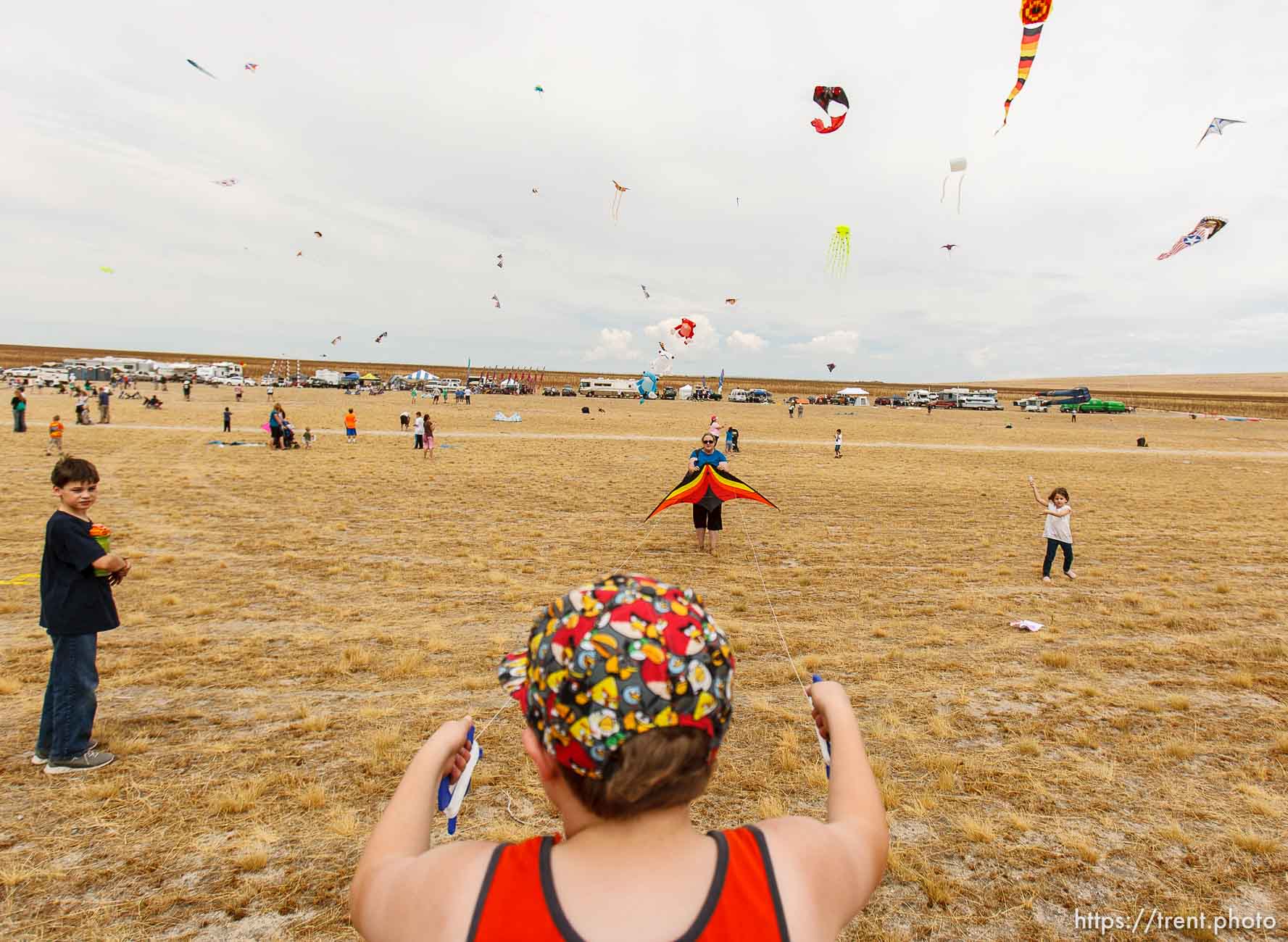 Trent Nelson  |  The Salt Lake Tribune
Connor Vincent gets some help from his grandmoter Margaret Putnam, flying a kite at the Antelope Island Stampede, Saturday, August 31, 2013 at Antelope Island's White Rock Bay.