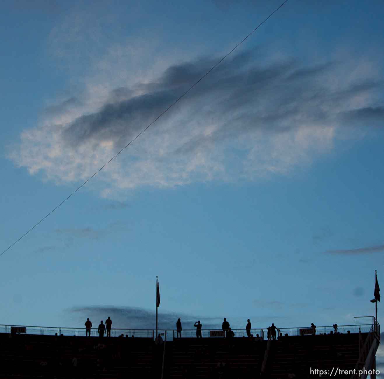 Trent Nelson  |  The Salt Lake Tribune
Fans watch the sun set before the game as the University of Utah hosts Oregon State, college football at Rice Eccles Stadium Saturday, September 14, 2013 in Salt Lake City.