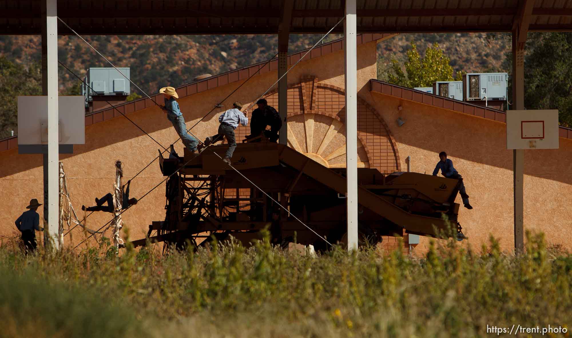 Trent Nelson  |  The Salt Lake Tribune
Boys playing on farm equipment/tractor, during school recess in Colorado City Tuesday, October 8, 2013.