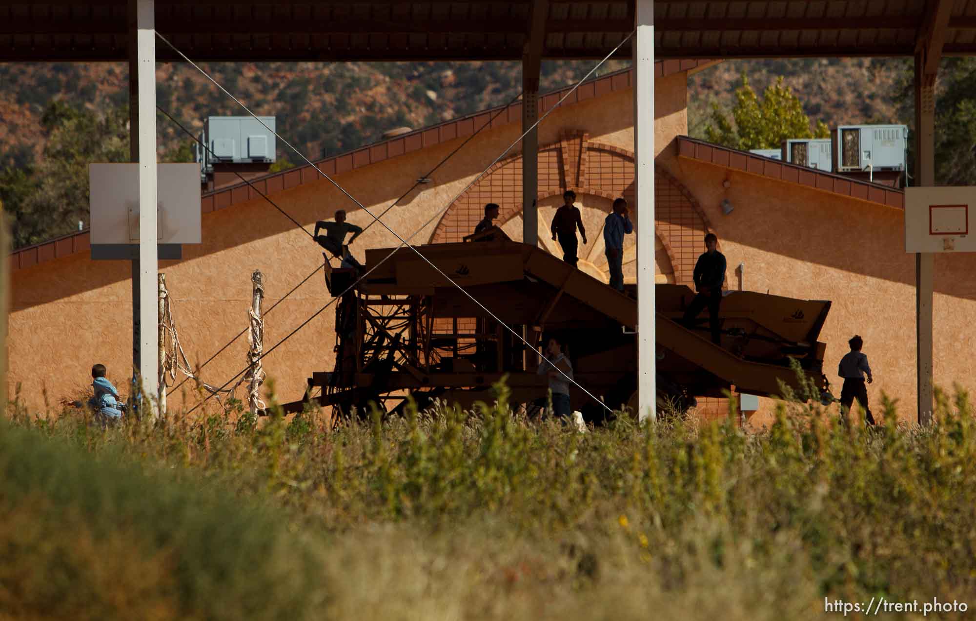 Trent Nelson  |  The Salt Lake Tribune
Boys playing on farm equipment/tractor, during school recess in Colorado City Tuesday, October 8, 2013.