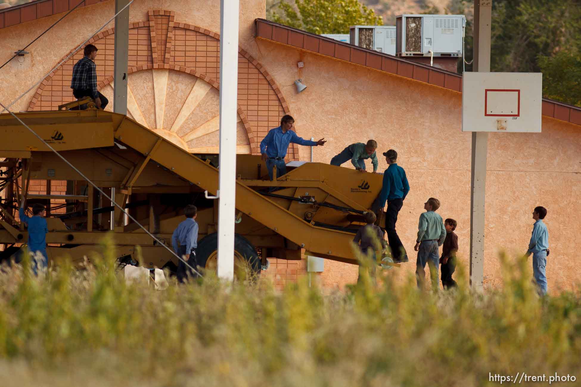 Trent Nelson  |  The Salt Lake Tribune
Boys playing on farm equipment/tractor, during school recess in Colorado City Tuesday, October 8, 2013.