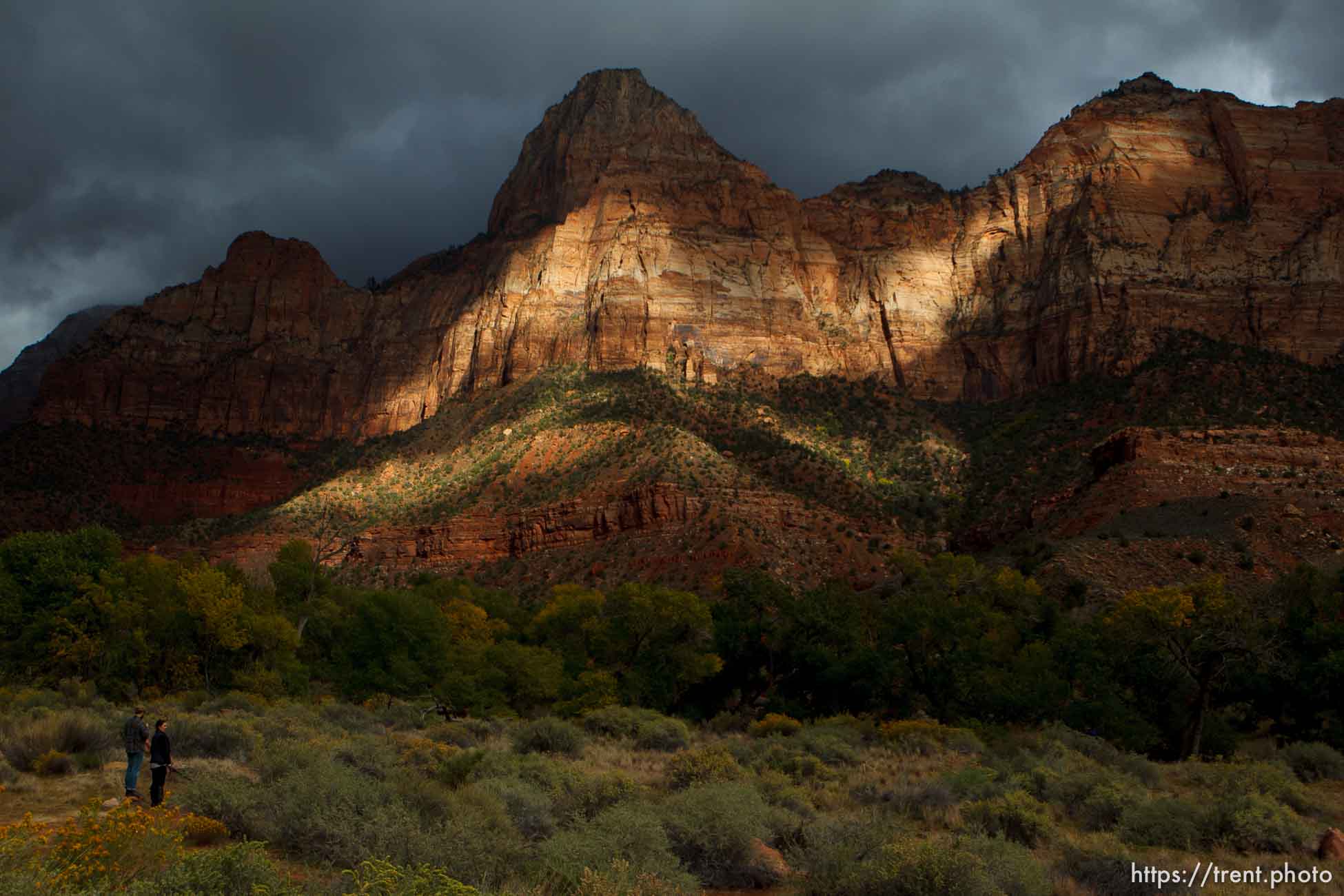 Trent Nelson  |  The Salt Lake Tribune
The late afternoon sun lights up the entrance to Zion National Park, Thursday, October 10, 2013. The state and federal governments are working out the details of a deal to reopen the parks as the government shutdown continues.