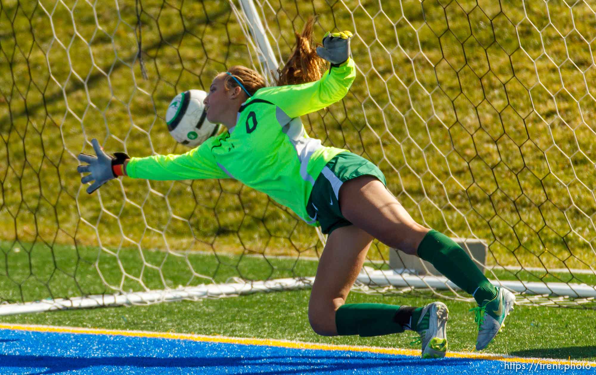 Trent Nelson  |  The Salt Lake Tribune
Juan Diego scores on a penalty kick by Emily Pascua as Snow Canyon's Grace Walton tries to make the save. Juan Diego High School hosts Snow Canyon in a 3A girls' soccer state quarterfinal match in Draper, Saturday October 19, 2013.