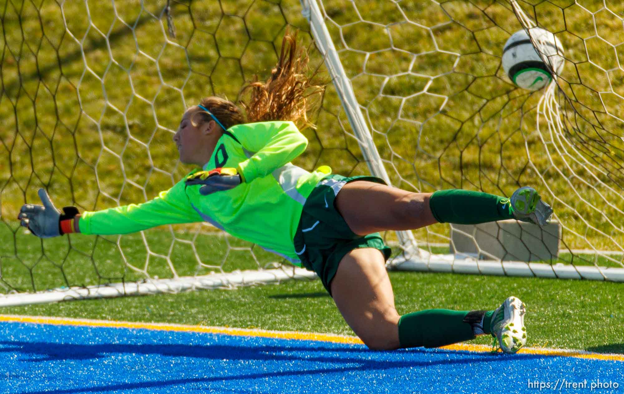 Trent Nelson  |  The Salt Lake Tribune
Juan Diego scores on a penalty kick by Emily Pascua as Snow Canyon's Grace Walton tries to make the save. Juan Diego High School hosts Snow Canyon in a 3A girls' soccer state quarterfinal match in Draper, Saturday October 19, 2013.