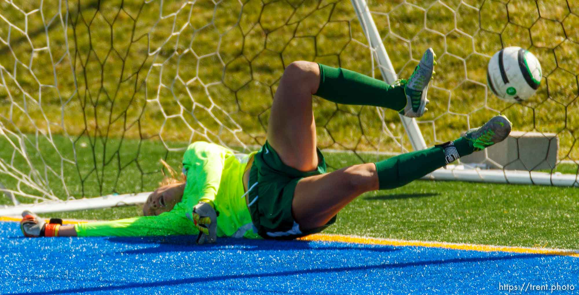 Trent Nelson  |  The Salt Lake Tribune
Juan Diego scores on a penalty kick by Emily Pascua as Snow Canyon's Grace Walton tries to make the save. Juan Diego High School hosts Snow Canyon in a 3A girls' soccer state quarterfinal match in Draper, Saturday October 19, 2013.