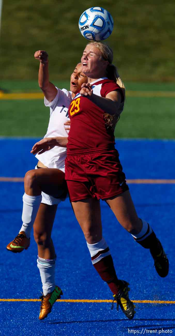 Trent Nelson  |  The Salt Lake Tribune
Timpanogos's Amanda Marshall and Mountain View's Nicole Smith head the ball, as Mountain View faces Timpanogos High School in a 4A girls state soccer semifinal match, Tuesday October 22, 2013.