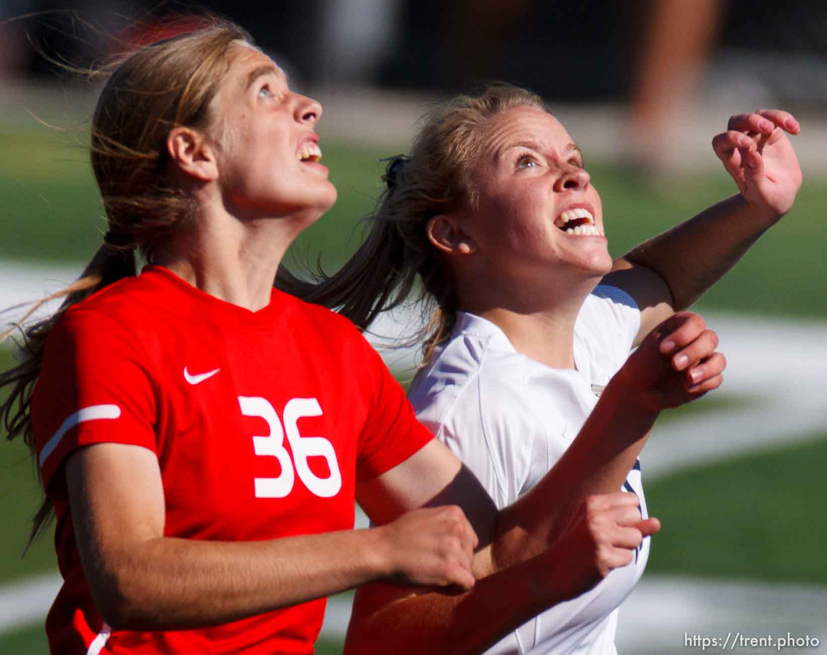 Trent Nelson  |  The Salt Lake Tribune
East's 36 and Skyline's Tysa Sillitoe race for the ball, as East faces Skyline High School in a 4A girls state soccer semifinal match, Tuesday October 22, 2013.