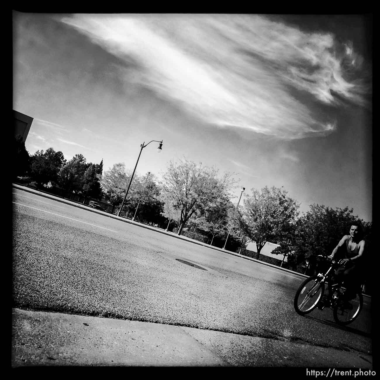 man on bike along State Street, Monday October 21, 2013.