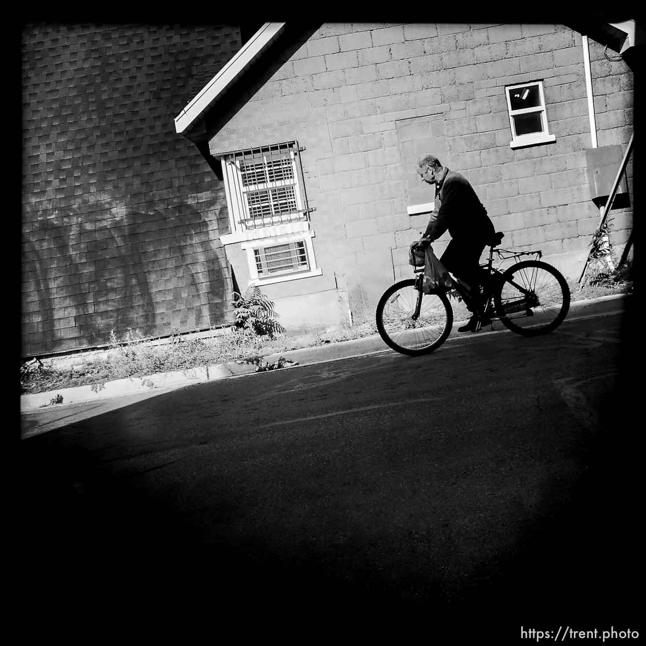 man on bike, along State Street, Monday October 21, 2013.