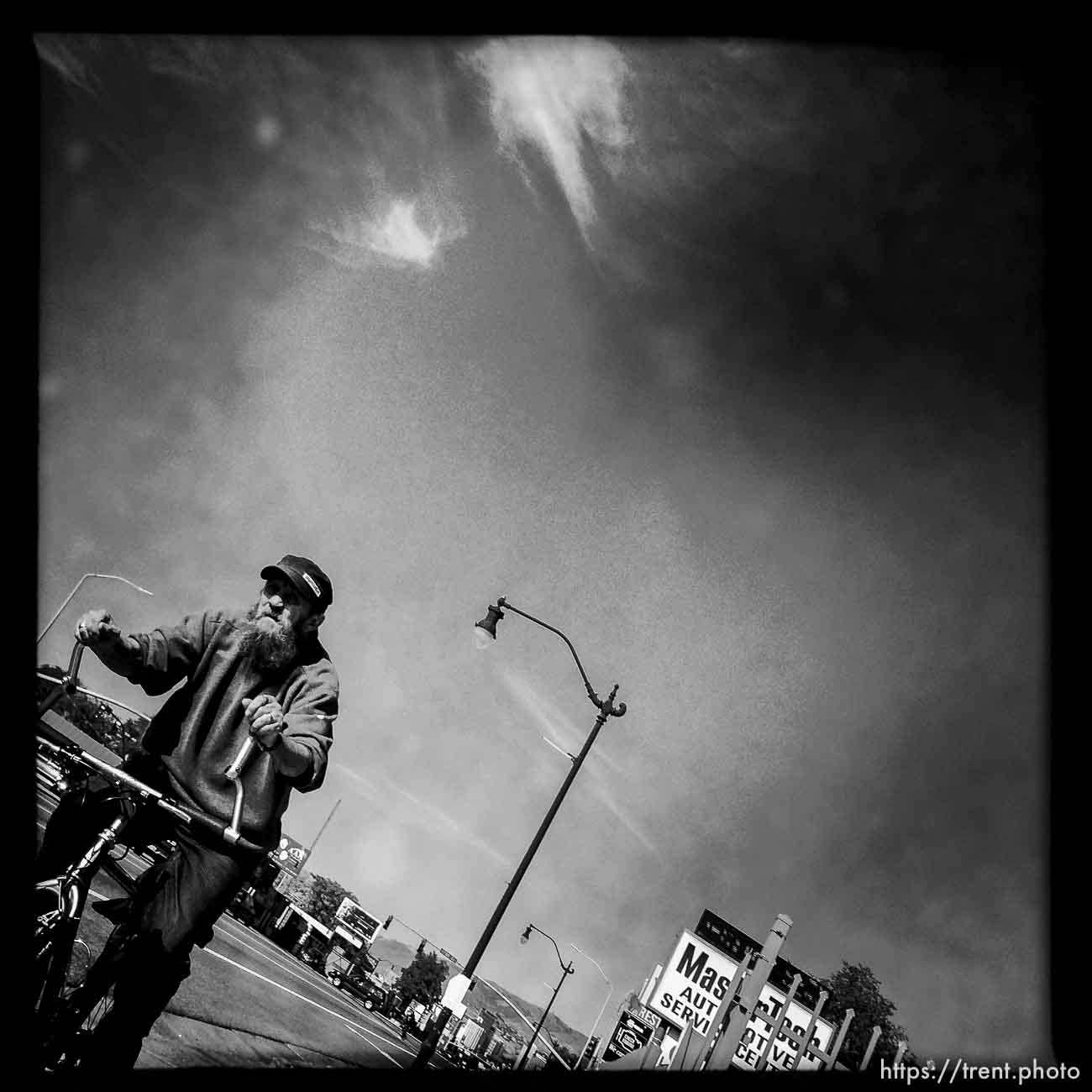 guy riding bike, along State Street, Monday October 21, 2013.