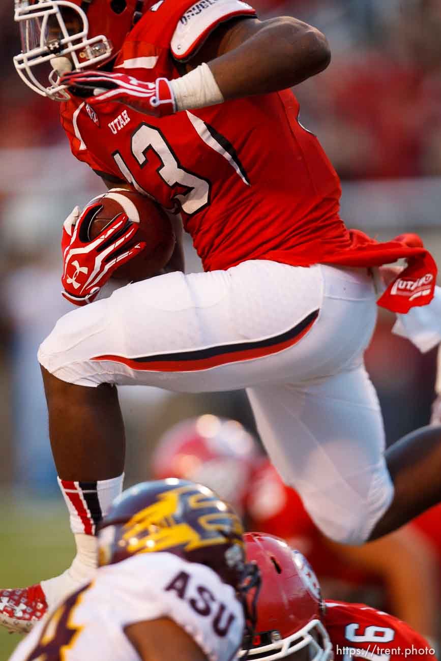 Trent Nelson  |  The Salt Lake Tribune
Utah Utes running back Kelvin York (13) runs the ball as the University of Utah hosts Arizona State, college football at Rice-Eccles Stadium in Salt Lake City, Saturday November 9, 2013.