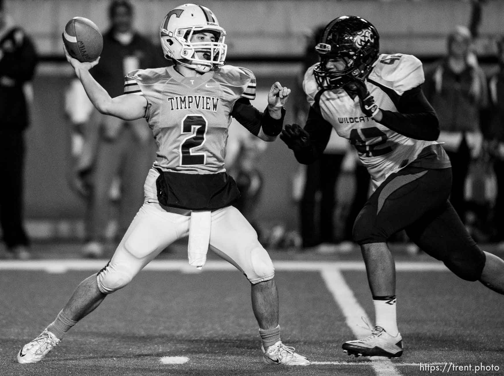 Trent Nelson  |  The Salt Lake Tribune
Timpview quarterback Britain Covey makes a pass just before being hit by Woods Cross's Deion Saumalu as Woods Cross faces Timpview High School in the 4A State Semifinals in Salt Lake City, Thursday November 14, 2013.