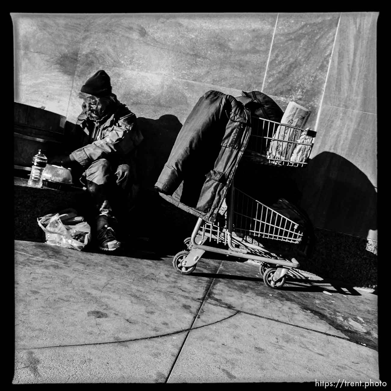 homeless guy and cart, along State Street, Monday November 18, 2013.