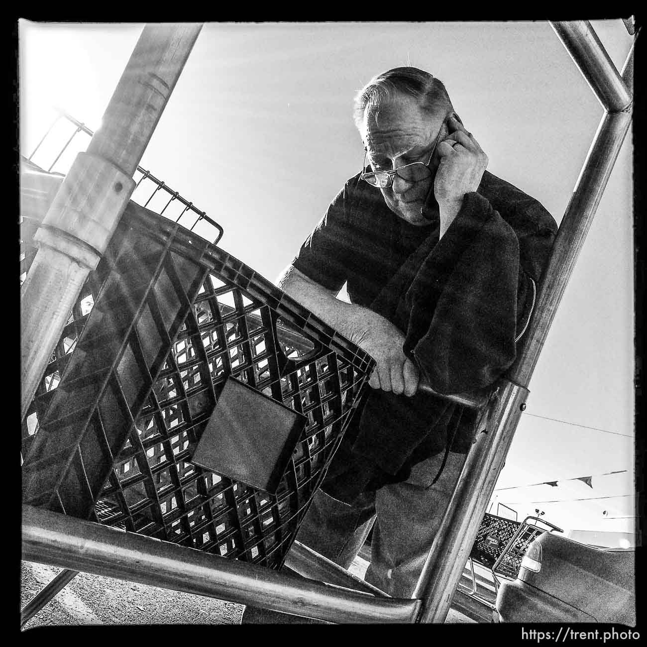 guy on phone, along State Street, Monday November 18, 2013.