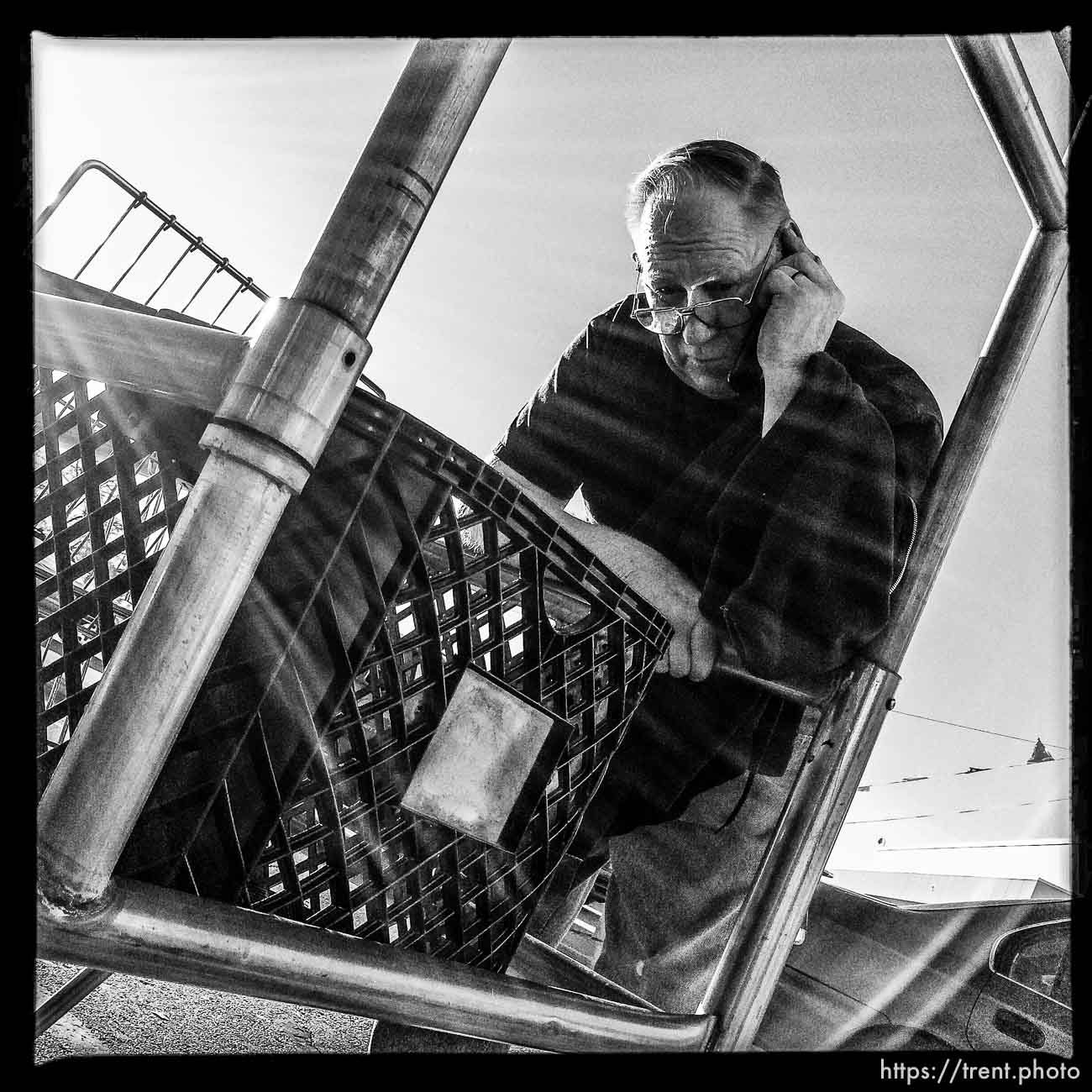 guy on phone, along State Street, Monday November 18, 2013.