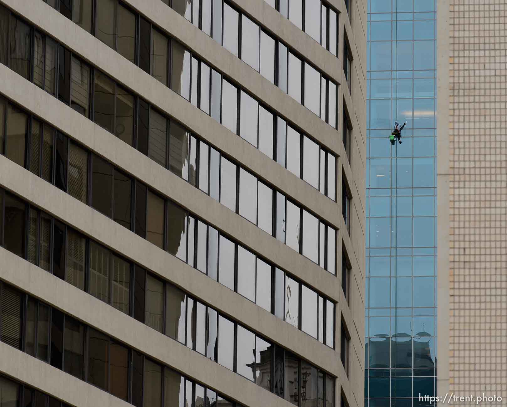 Trent Nelson  |  The Salt Lake Tribune
Window washers hanging on the Wells Fargo Building in Salt Lake City on a chilly Friday, November 15, 2013.