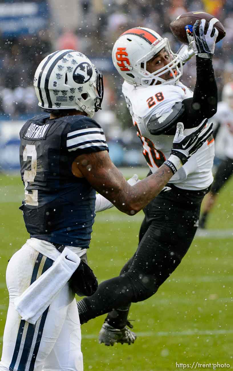 Trent Nelson  |  The Salt Lake Tribune
Idaho State Bengals defensive back Cameron Gupton (28) intercepts a pass intended for Brigham Young Cougars wide receiver Cody Hoffman (2), as BYU hosts Idaho State, college football at LaVell Edwards Stadium in Provo, Saturday November 16, 2013.