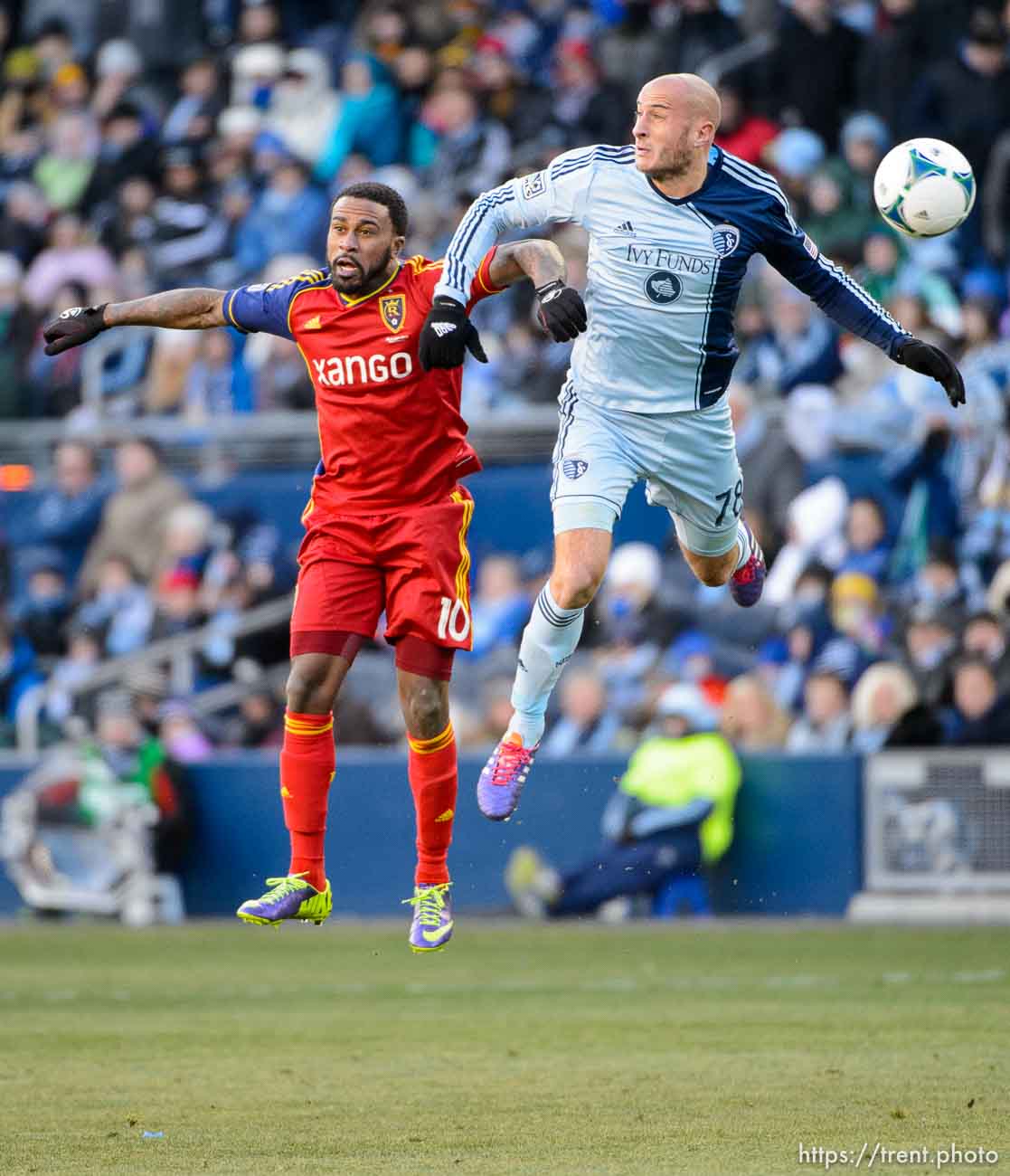 Trent Nelson  |  The Salt Lake Tribune
Real Salt Lake's Robbie Findley (10) and Sporting KC's Aurelien Collin (78) leap for the ball as Real Salt Lake faces Sporting KC in the MLS Cup Final at Sporting Park in Kansas City, Saturday December 7, 2013.