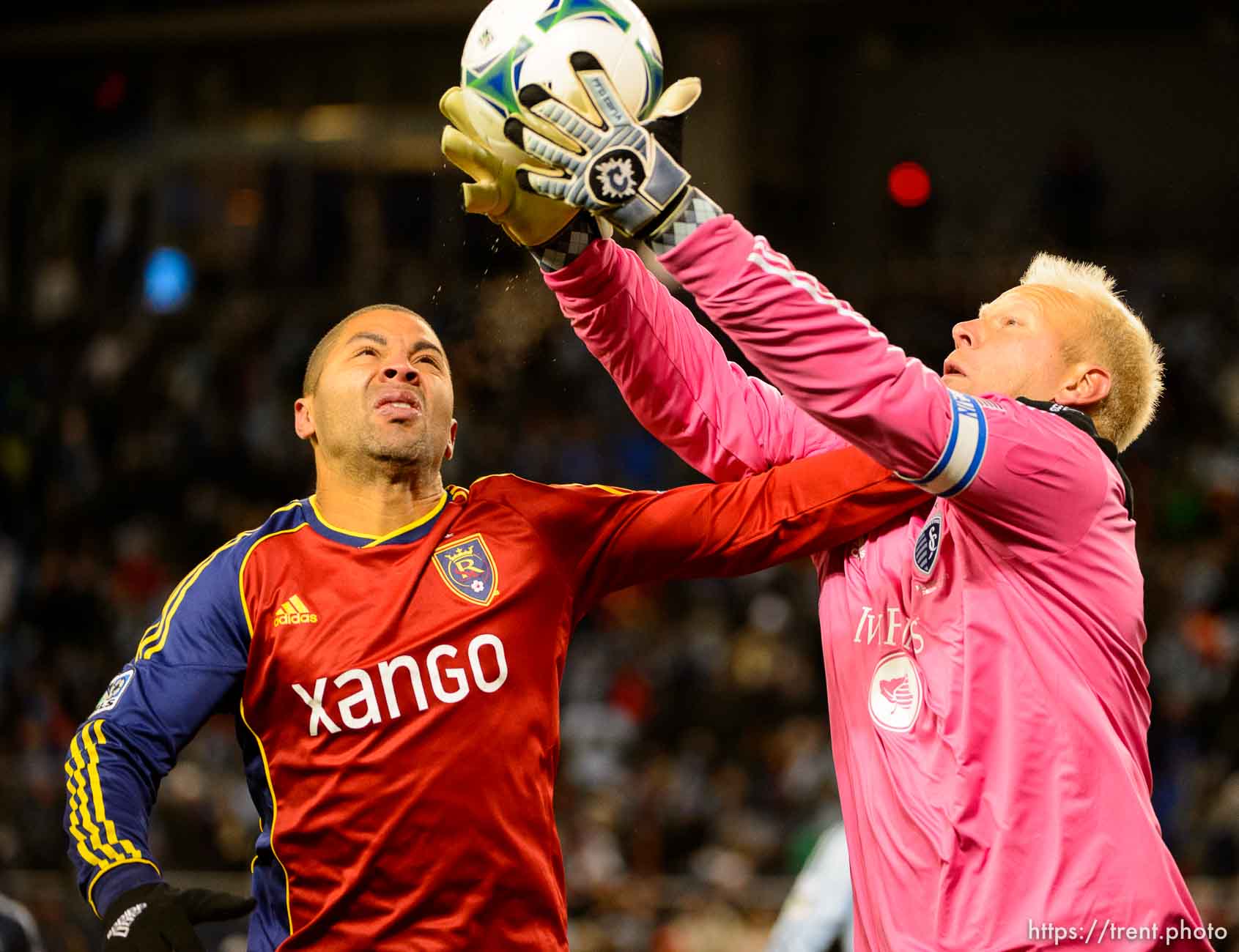 Trent Nelson  |  The Salt Lake Tribune
RSL's Alvaro Saborio and Sporting KC's Jimmy Nielsen (1) leap for the ball as Real Salt Lake faces Sporting KC in the MLS Cup Final at Sporting Park in Kansas City, Saturday December 7, 2013.