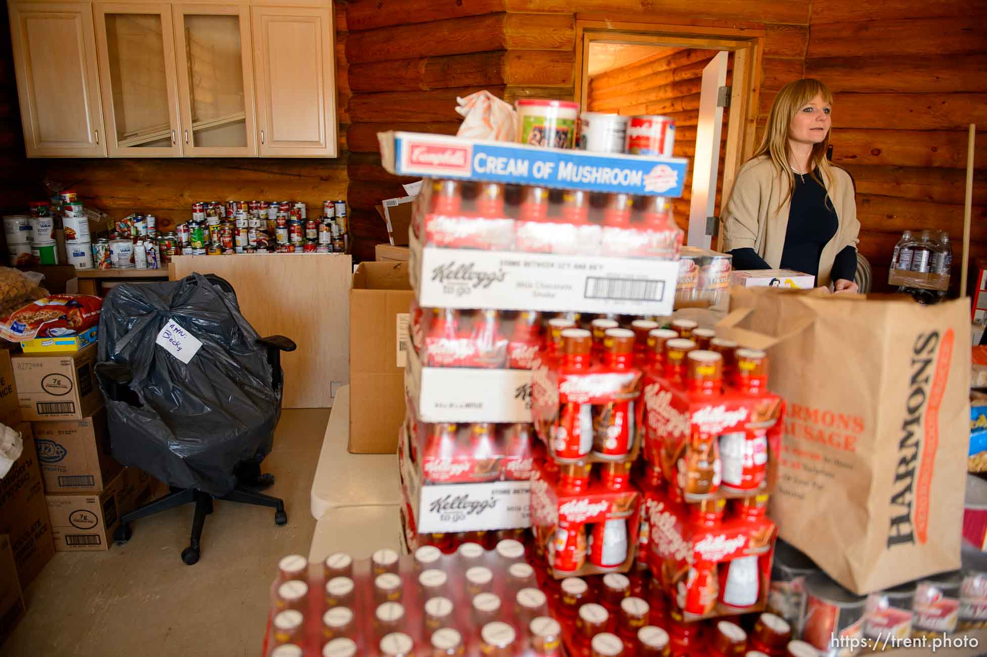 Trent Nelson  |  The Salt Lake Tribune
Ruth Olson looks over donations for a planned thrift store at the community center in Colorado City that is being set up by Holding Out Hope, Saturday December 14, 2013.