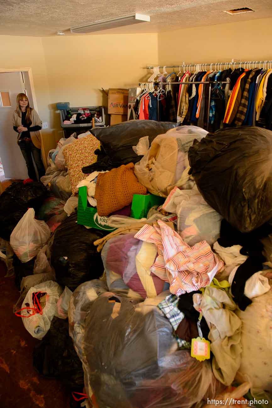 Trent Nelson  |  The Salt Lake Tribune
Ruth Olson looks over donations for a planned thrift store at the community center in Colorado City that is being set up by Holding Out Hope, Saturday December 14, 2013.