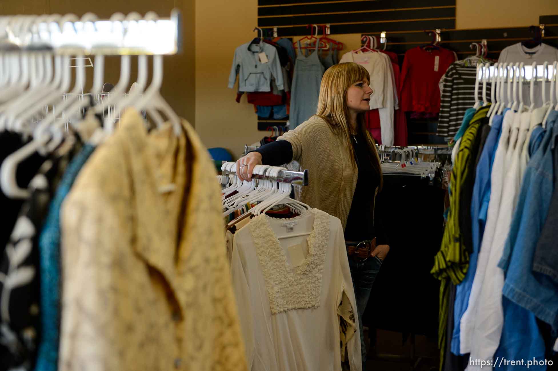 Trent Nelson  |  The Salt Lake Tribune
Ruth Olson looks over donations for a planned thrift store at the community center in Colorado City that is being set up by Holding Out Hope, Saturday December 14, 2013.