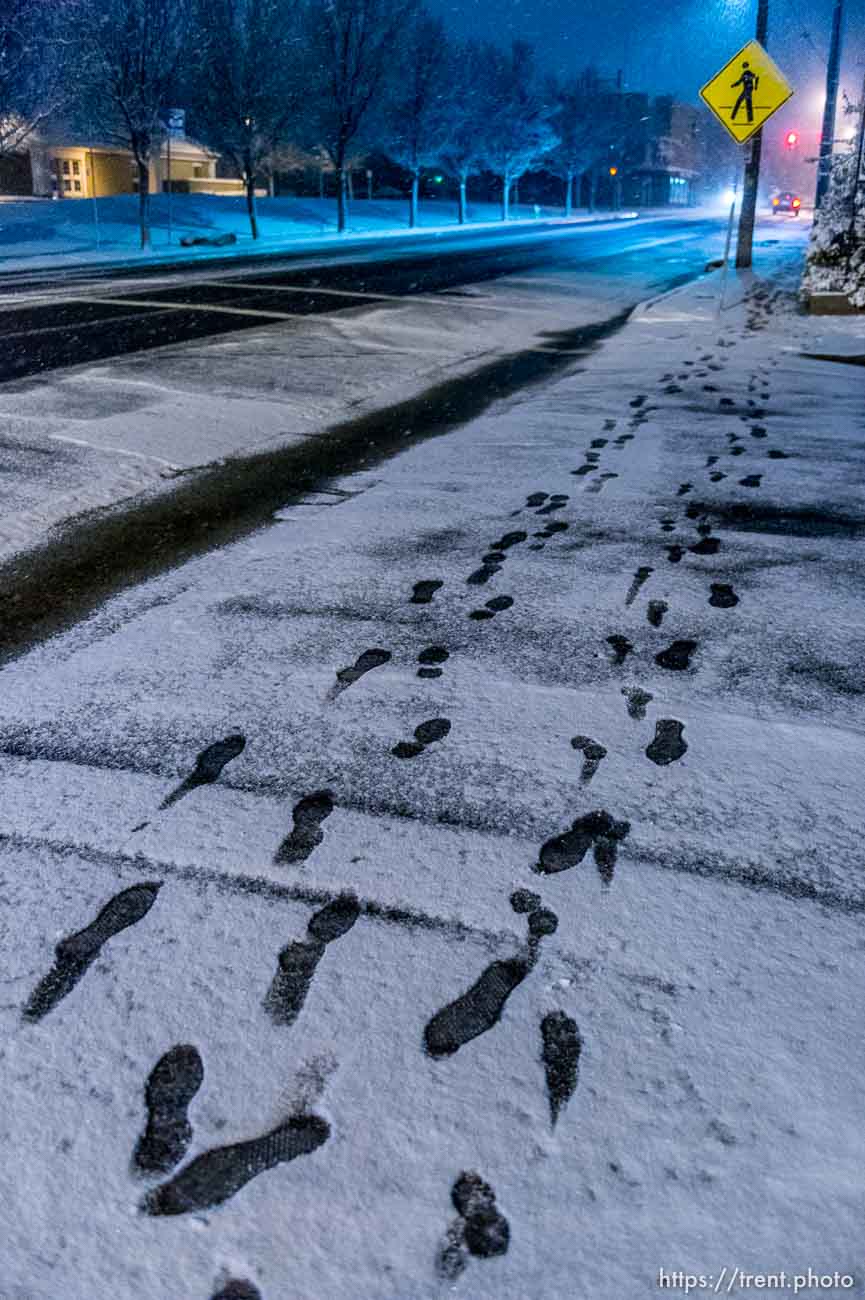 Trent Nelson  |  The Salt Lake Tribune
footprints in the snow, during a light snowfall in the early morning hours in Salt Lake City, Tuesday December 3, 2013.