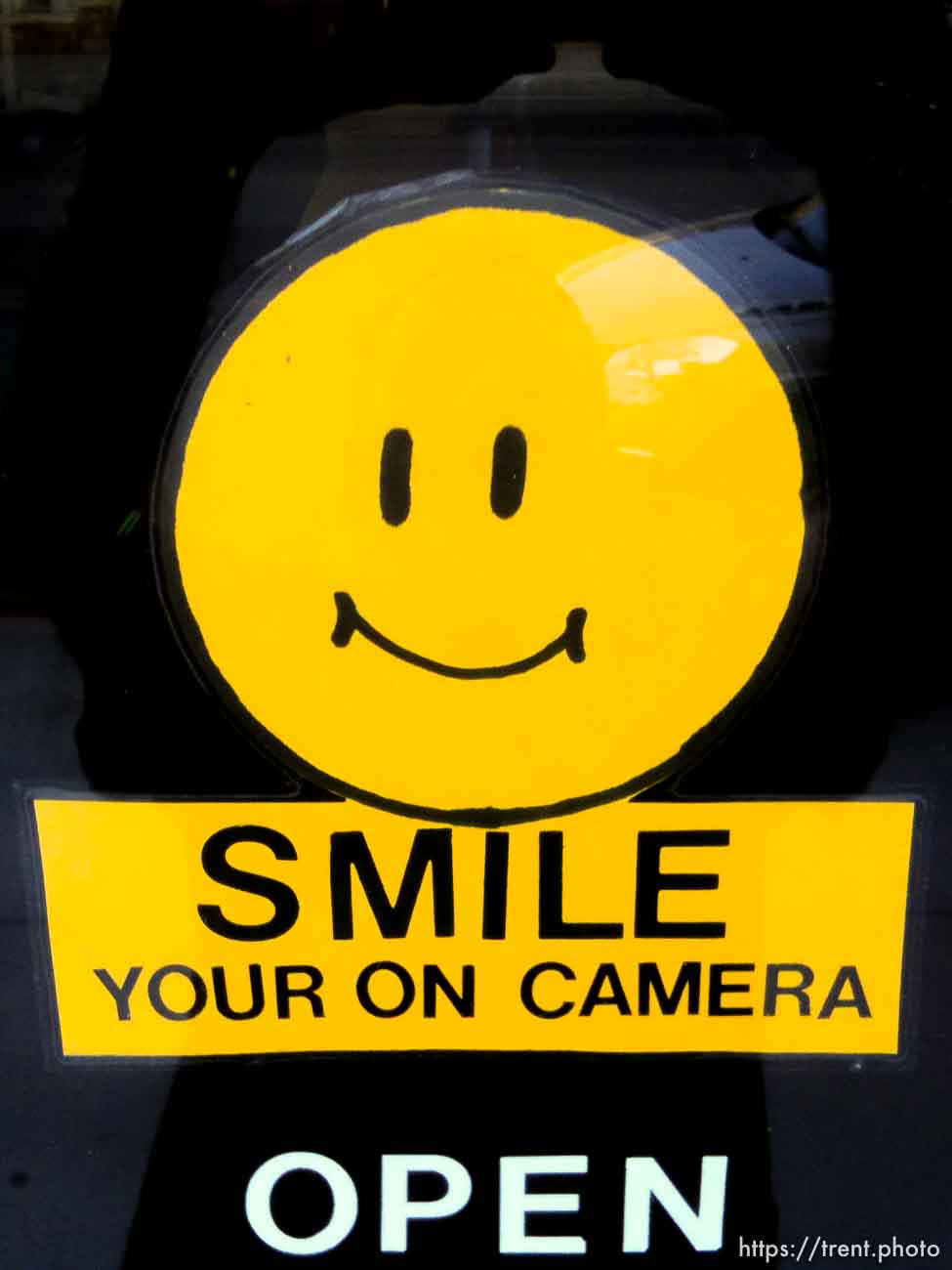 smile your on camera. open.