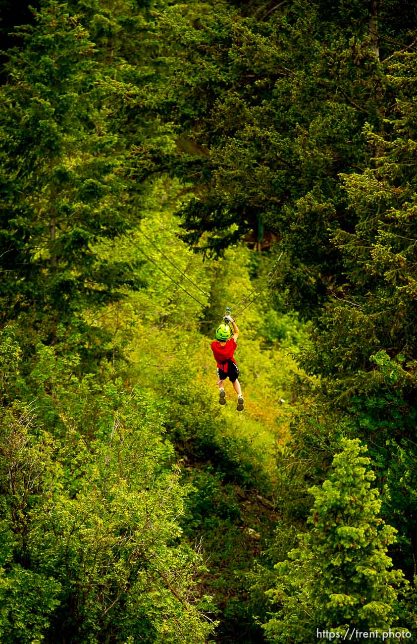 Trent Nelson  |  The Salt Lake Tribune
Benjamin Bolton in flight at Max Zipline, in Provo Canyon, Saturday May 31, 2014.