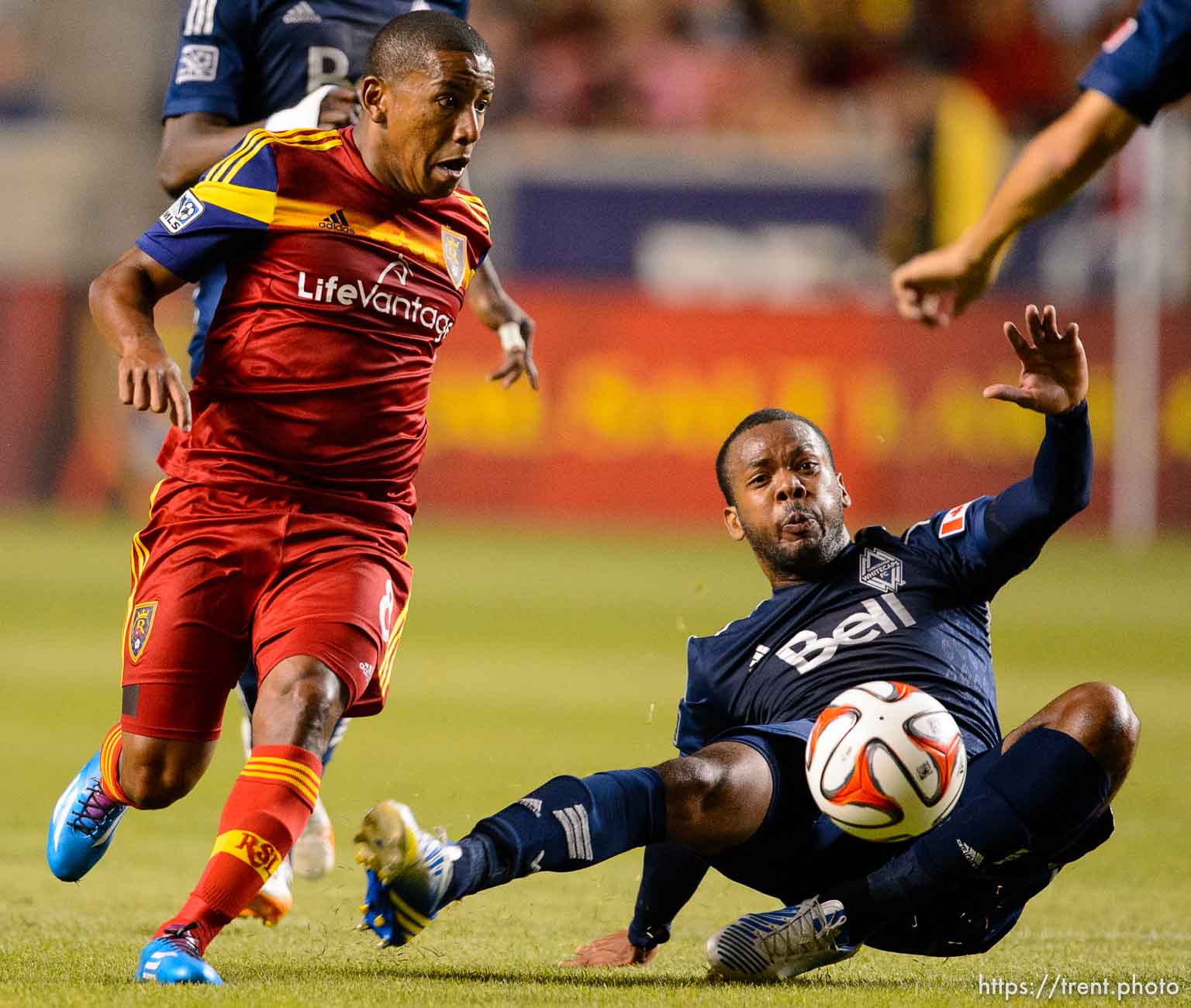 Trent Nelson  |  The Salt Lake Tribune
Real Salt Lake's Joao Plata (8) loses the ball to Vancouver's Carlyle Mitchell (24), as Real Salt Lake hosts Vancouver Whitecaps FC at Rio Tinto Stadium in Sandy, Saturday July 19, 2014.