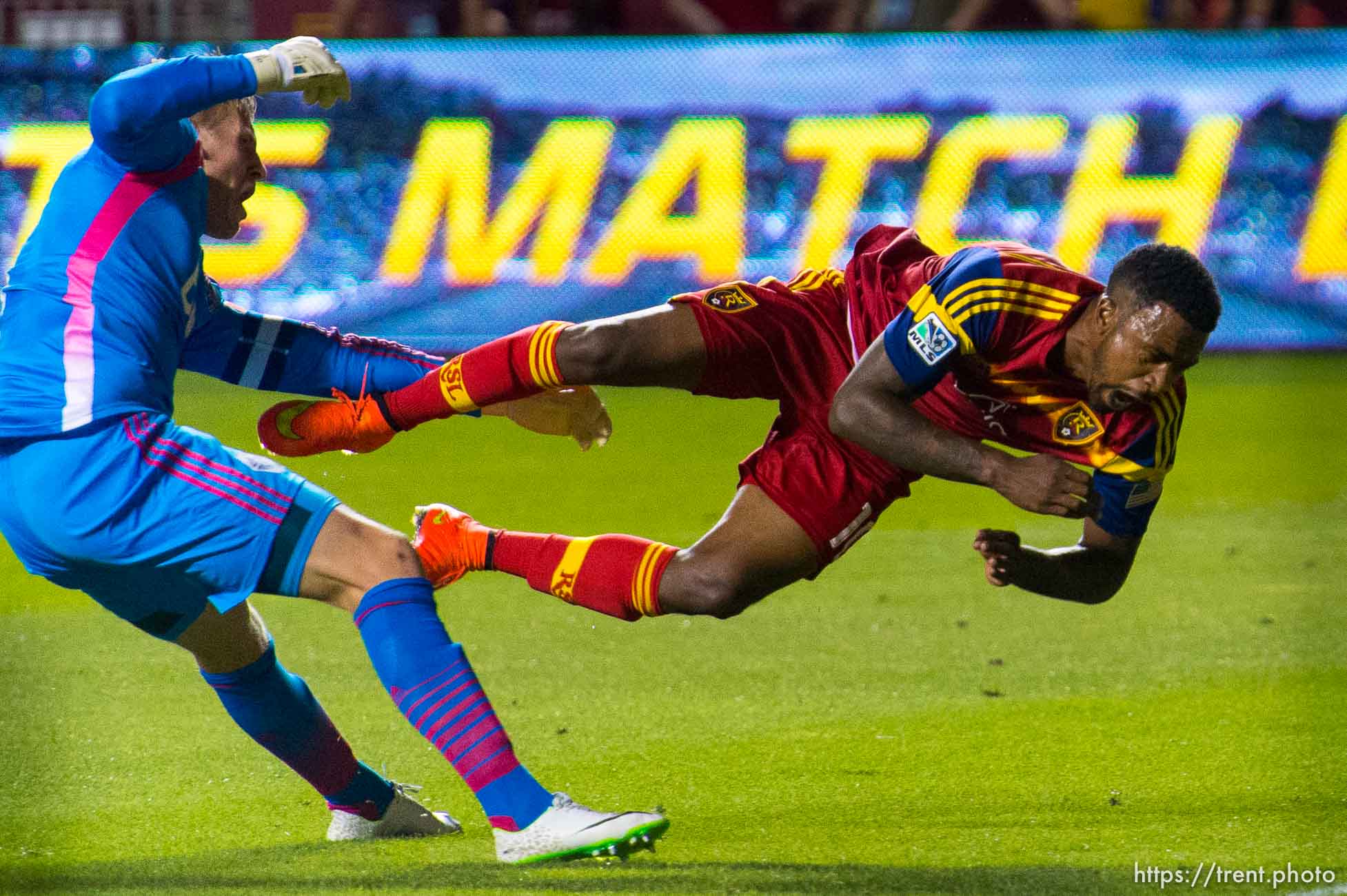 Trent Nelson  |  The Salt Lake Tribune
Real Salt Lake's Robbie Findley (10) collides with Vancouver's David Ousted (1) as Real Salt Lake hosts Vancouver Whitecaps FC at Rio Tinto Stadium in Sandy, Saturday July 19, 2014.