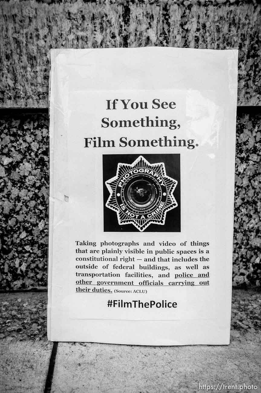 if you see something, film something sign. rally against police shootings of michael brown, dillon taylor, Salt Lake City, Wednesday, August 20, 2014.