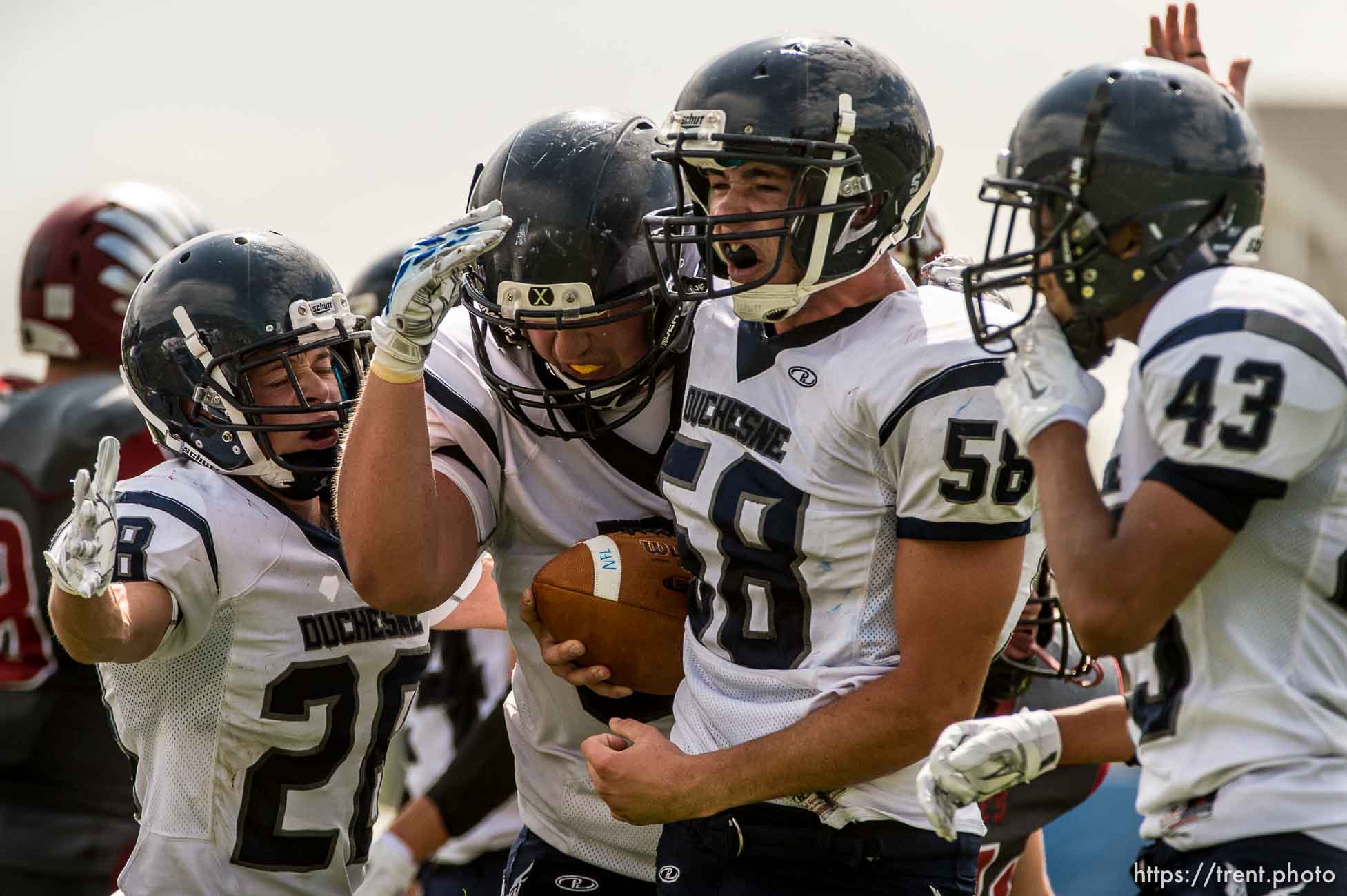 Trent Nelson  |  The Salt Lake Tribune
Duchesne's Jacob Plummer (58) celebrates a turnover as Layton Christian hosts Duchesne, high school football in Layton Thursday August 21, 2014.