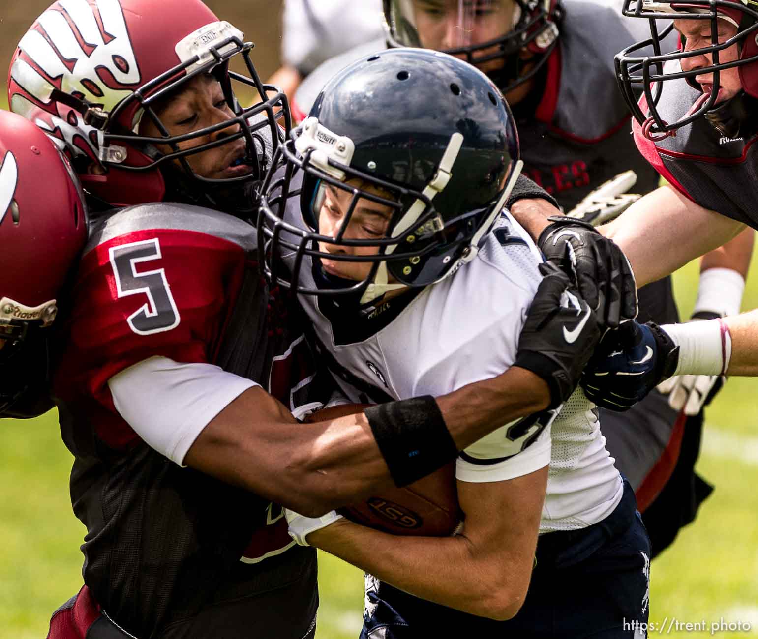 Trent Nelson  |  The Salt Lake Tribune
Layton Christian's Raekwon McElroy wraps up Layton Christian's Layne Coil, as Layton Christian hosts Duchesne, high school football in Layton Thursday August 21, 2014.