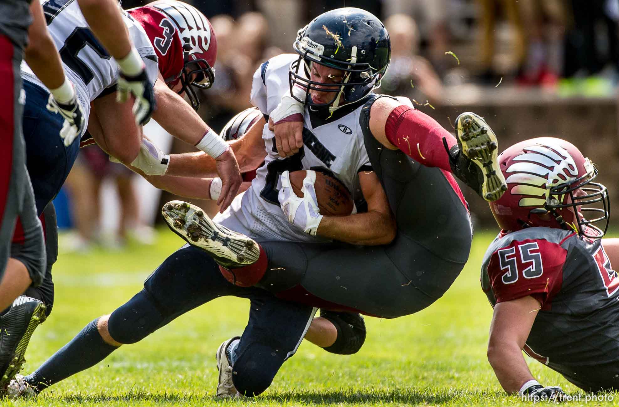 Trent Nelson  |  The Salt Lake Tribune
Duchesne's Daniel Hanberg is stopped as Layton Christian hosts Duchesne, high school football in Layton Thursday August 21, 2014.