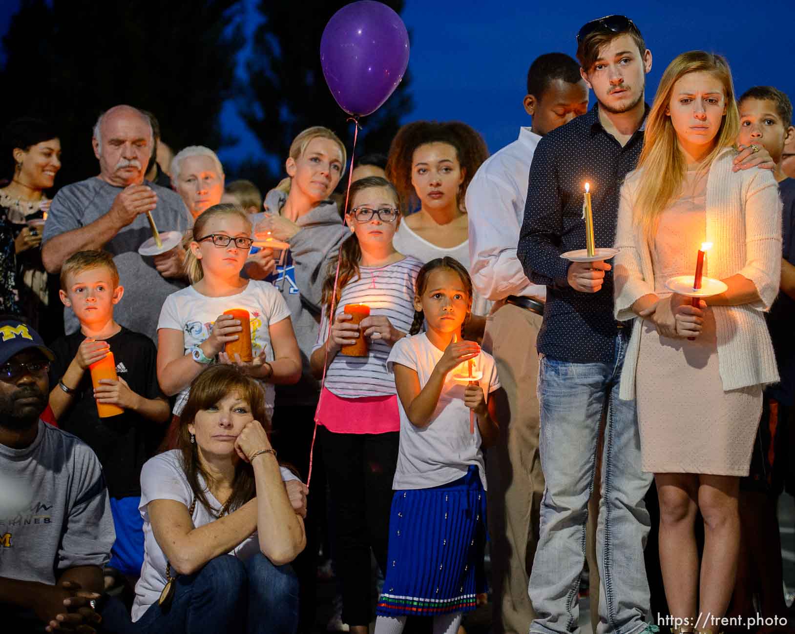 Trent Nelson  |  The Salt Lake Tribune
Susan Hunt, lower left, listens to stories about her son, Darrien Hunt, at a candlelight vigil Sunday September 14, 2014 for Darrien, who was shot and killed by Saratoga Springs police.