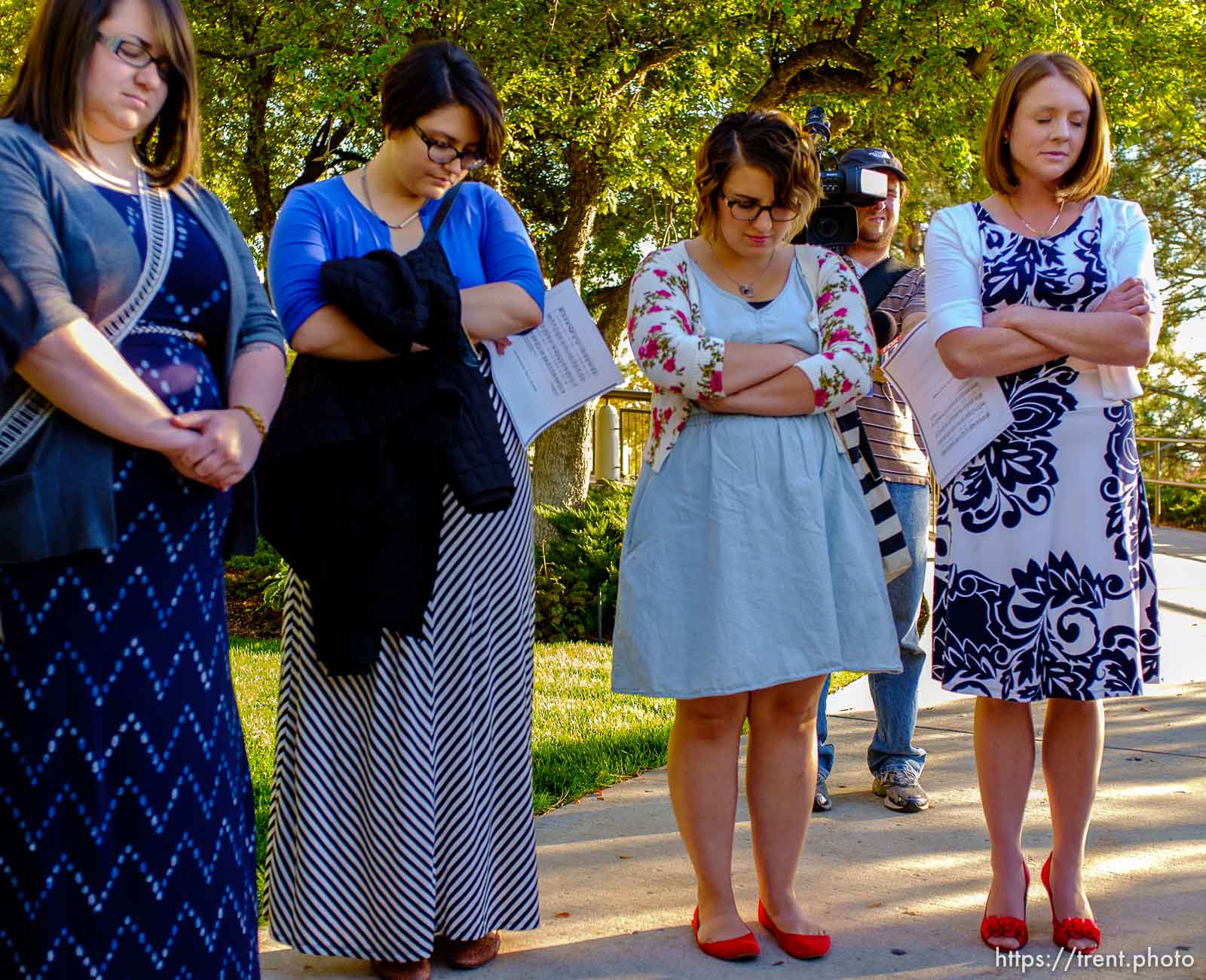 Trent Nelson  |  The Salt Lake Tribune
Ellen Koester, Analisa Estrada, Cheryl Holdaway, and Abby Hansen pray before entering a broadcast of the LDS General Priesthood Session at BYU's Marriott Center in Provo Saturday October 4, 2014. The event was one of several planned by Ordain Women.