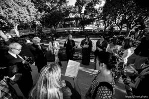 Trent Nelson  |  The Salt Lake Tribune
A group of people sing an LDS hymn before entering a broadcast of the LDS General Priesthood Session at BYU's Marriott Center in Provo Saturday October 4, 2014. The event was one of several planned by Ordain Women.