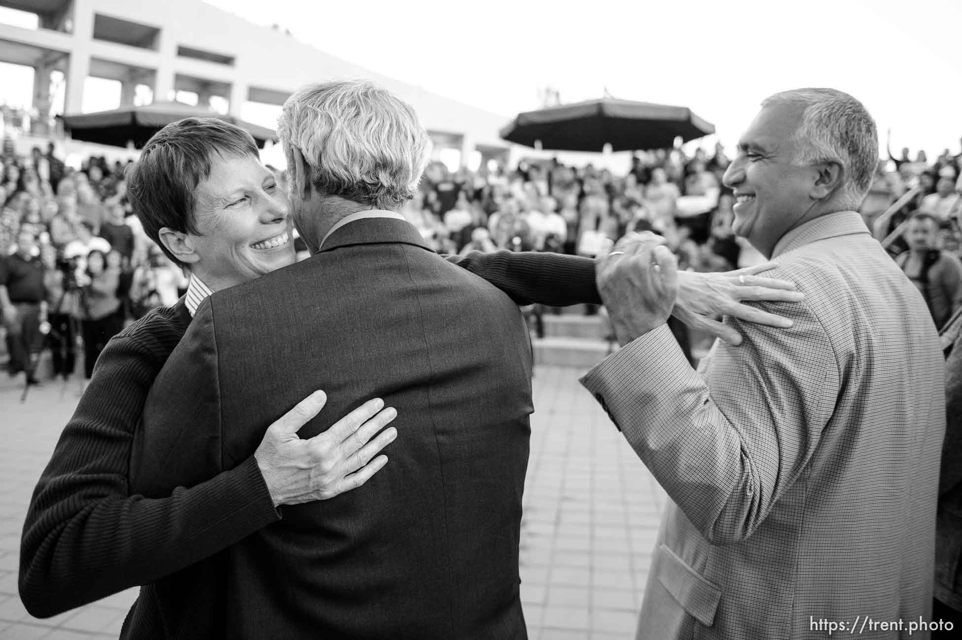 Trent Nelson  |  The Salt Lake Tribune
Kitchen v. Herbert plaintiff Kody Partridge hugs Salt Lake City Mayor Ralph Becker and reaches out to Salt Lake County District Attorney Sim Gill during a rally to celebrate today's legalization of same-sex marriage, Monday October 6, 2014 in Salt Lake City.