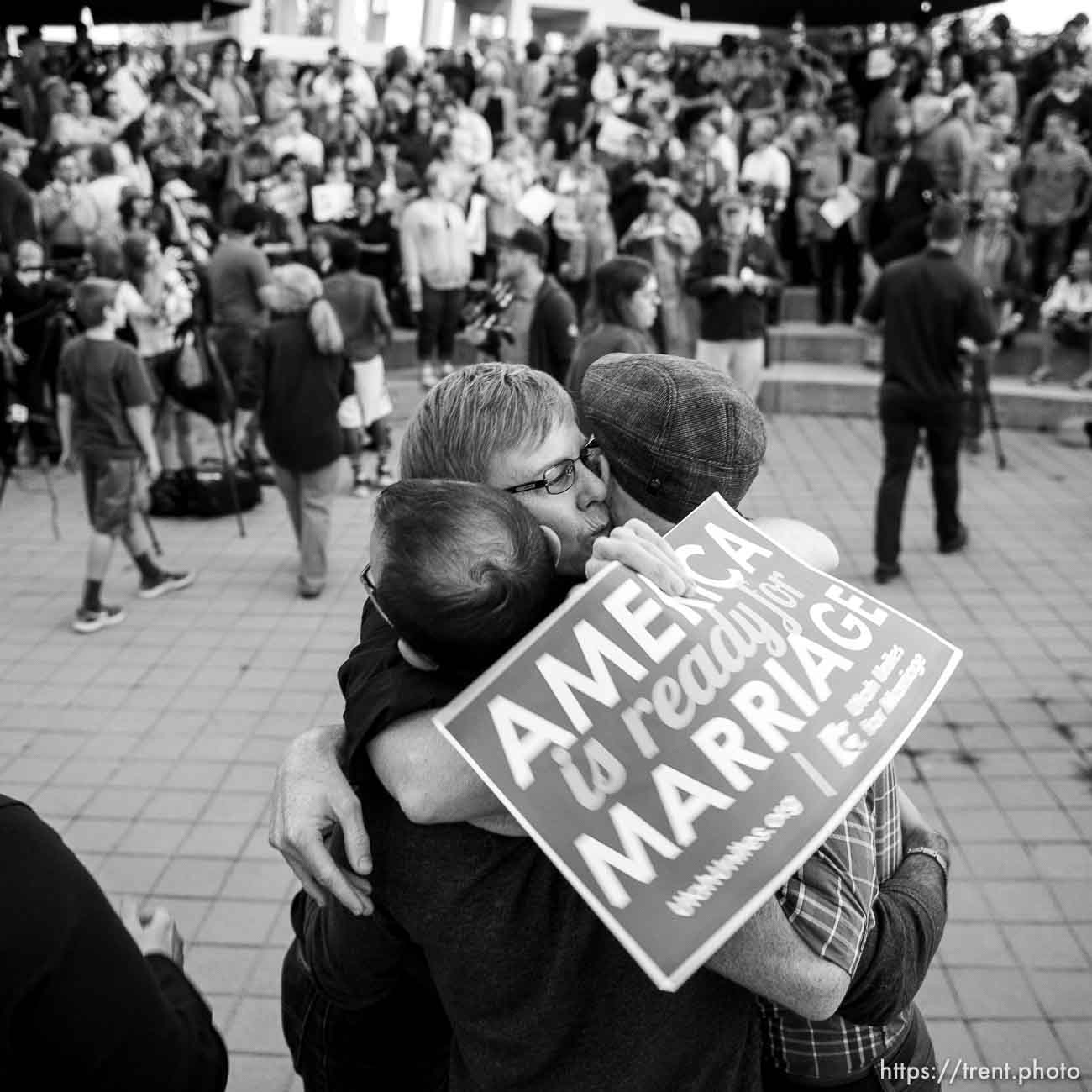 Trent Nelson  |  The Salt Lake Tribune
Debbie Johnson embraces Kitchen v. Herbert plaintiffs Derek Kitchen and Moudi Sbeity at a rally to celebrate today's legalization of same-sex marriage, Monday October 6, 2014 in Salt Lake City.