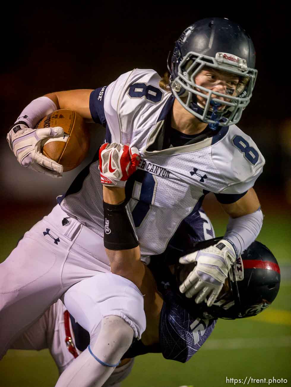 Trent Nelson  |  The Salt Lake Tribune
Corner Canyon's Jake Cahoon is brought down by Woods Cross's Keith Saylin as Woods Cross hosts Corner Canyon High School football, in Woods Cross, Wednesday October 15, 2014.